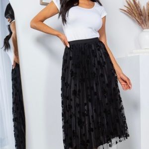 Black skirt with mesh outlayer